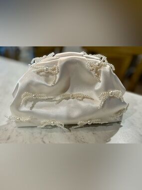 Sincerely Jules Pearl clutch